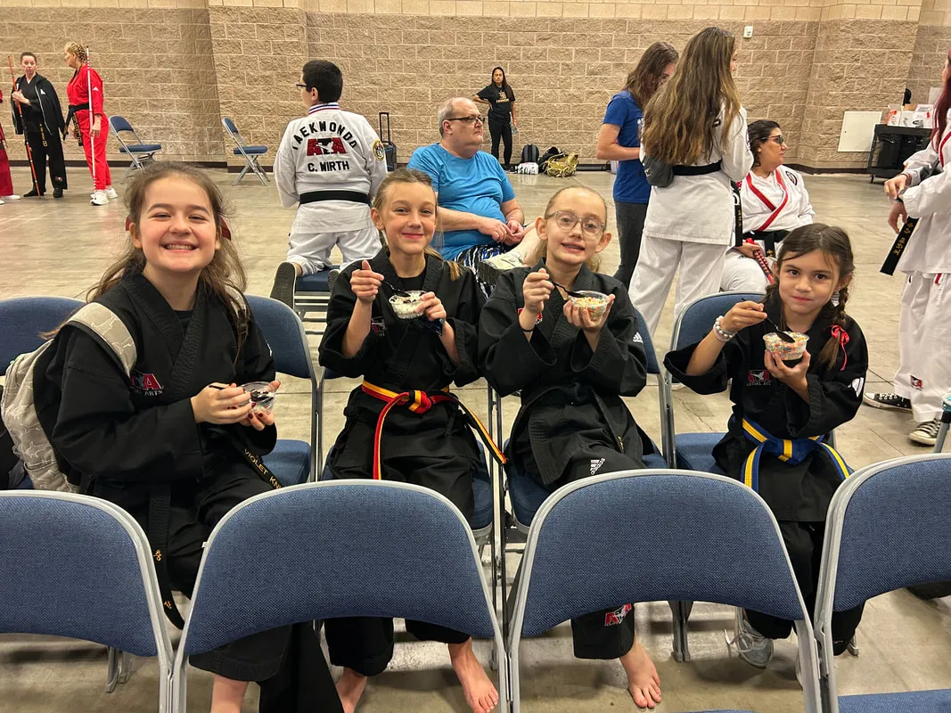 Students sitting together at a tournament